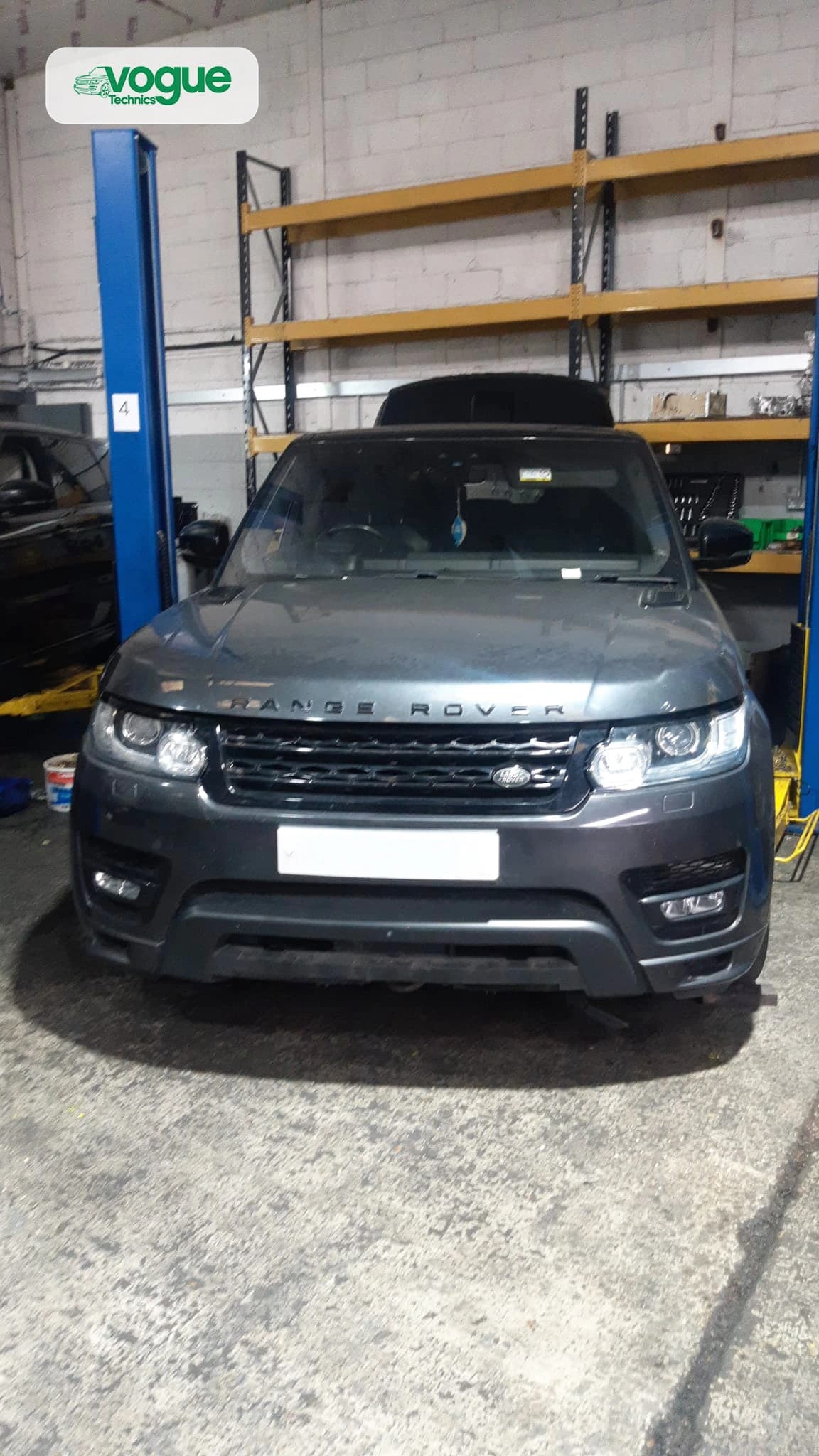 Vogue Technics engineer fitting reconditioned Range Rover engine — supply and fit service, Grays Essex