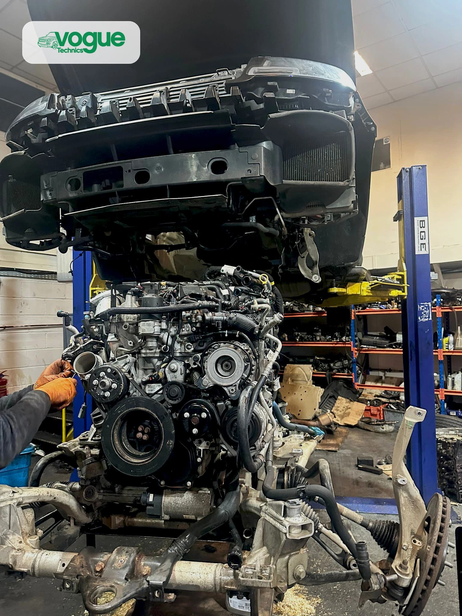 Range Rover Sport engine bay during engine removal for specialist replacement, Vogue Technics Essex